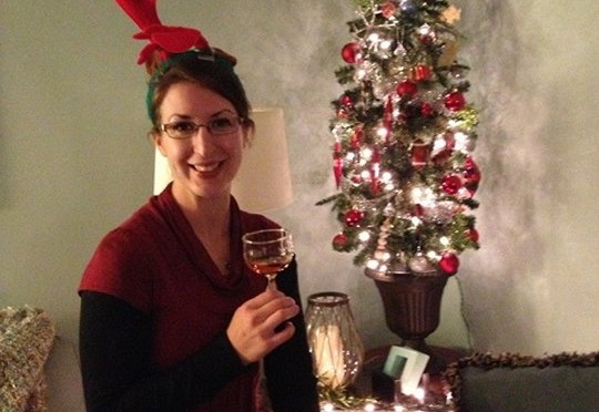 Becca sipping on some Donnafugata Ben Rye at a Christmas party in 2013