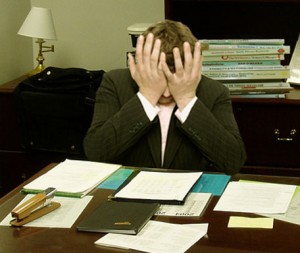 Photo By LaurMG. (Cropped from "File:Frustrated man at a desk.jpg".) [CC BY-SA 3.0 (http://creativecommons.org/licenses/by-sa/3.0)], via Wikimedia Commons